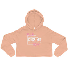 Load image into Gallery viewer, Peach cropped hoodie with white and pink RYKO logo. Raw cropped hem and drawstrings.