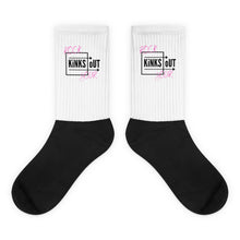 Load image into Gallery viewer, R.Y.K.O. pink and black logo socks with black cushioned bottom and white ribbed leg portion. Crew length.
